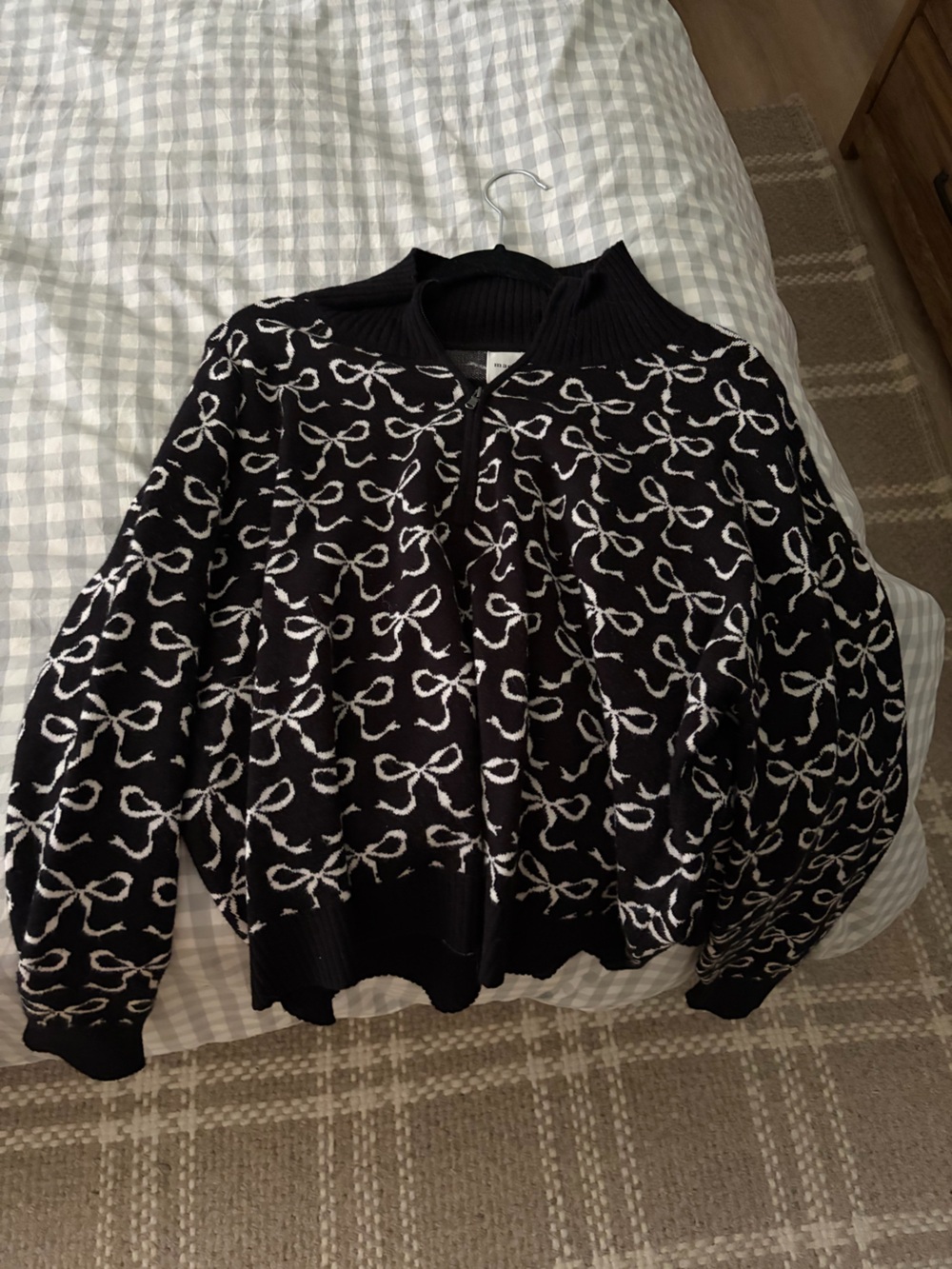 Maeve Black Sweater with White Bow Motif